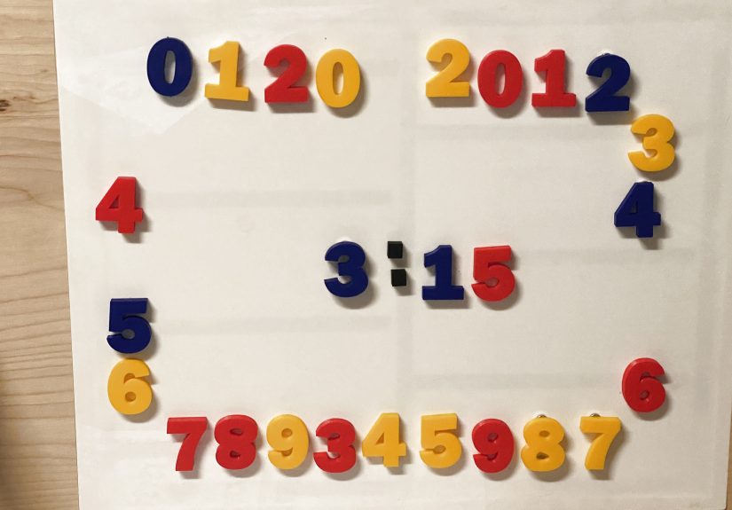 Moving Fridge Magnets Make For Unique Clock
