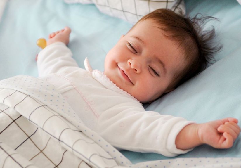 When Is It Safe for My Baby to Sleep with a Blanket?